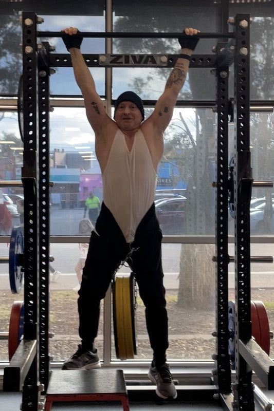Pull up with a 35kg weight plate over 60's category