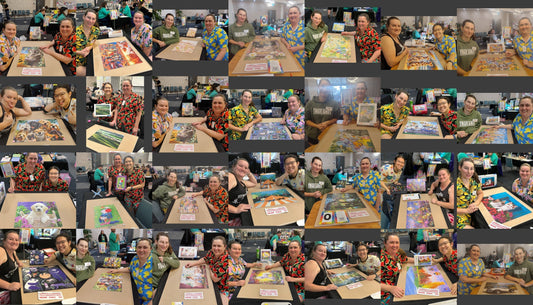 Most 500 piece puzzles completed in 28 hours by a team of 4, relay style is 28