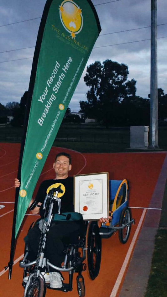 Wheelchair marathon whilst towing a 24kg kettlebell