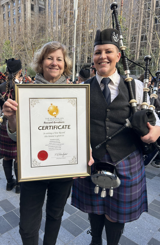 Largest ladies pipe band playing at the same time in the same location